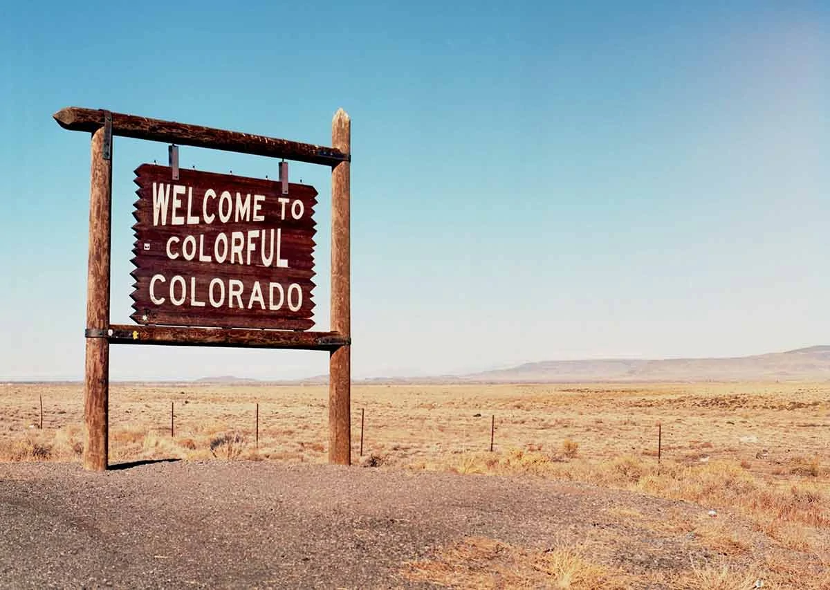 Sign at Badger Creek that says "Welcome to Colorful Colorado"